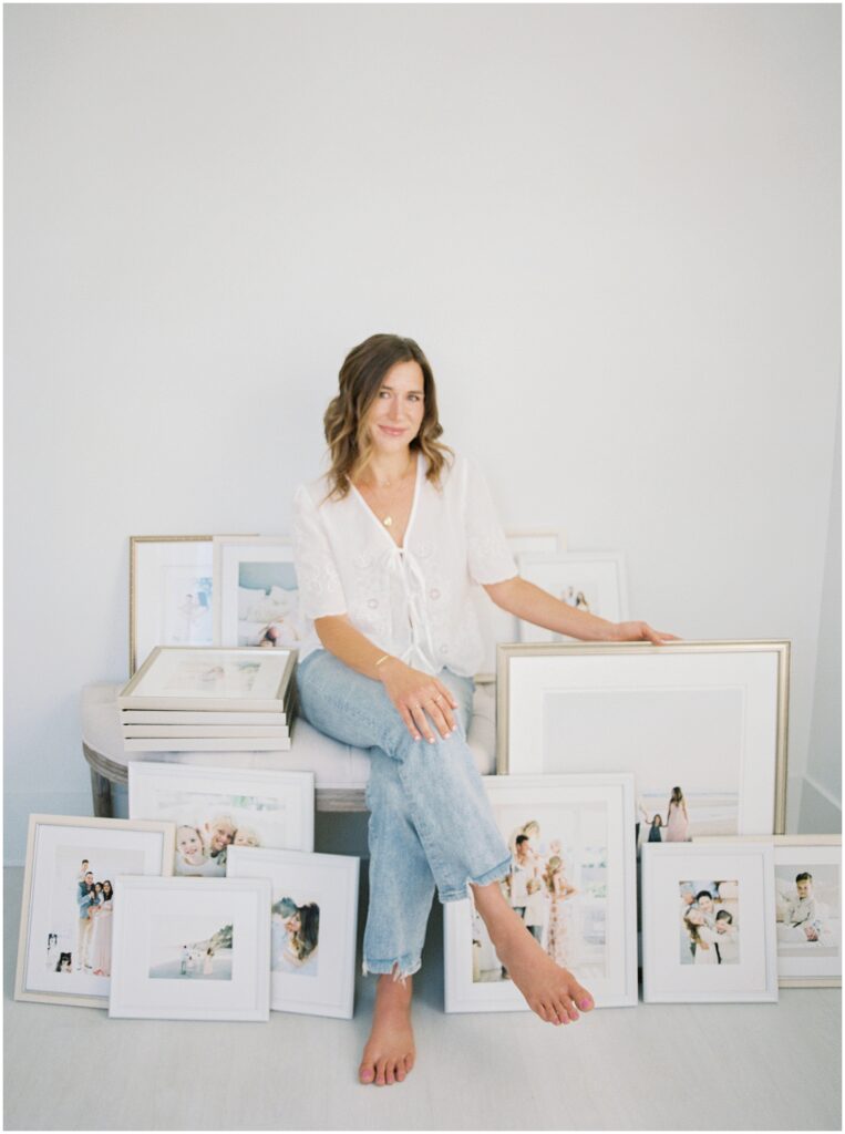 Michelle Popp, Raleigh newborn and family photographer, smiling in studio