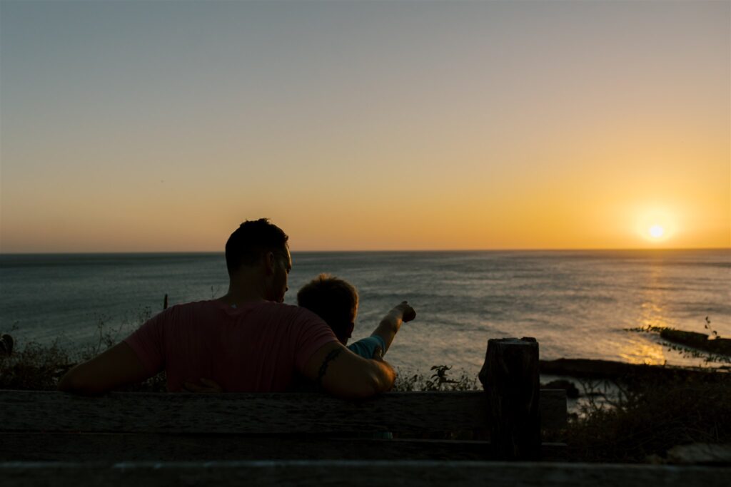 boy and watching sunset at Morgan Rock's Nicaragua